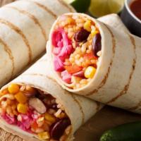 Vegetable Burrito · Flour tortilla stuffed with rice and Indian cottage cheese, onions, bell pepper, garbanzo be...