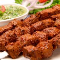 Tandoori Boti Kabab · Lamb cubes marinated with indian spices & yogurt sauce & cooked in clay oven.