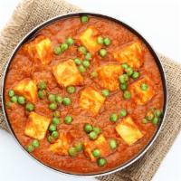 Matar Paneer · Homemade cheese cooked in indian spiced sauce.