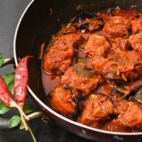 Garlic Chicken · Roasted garlic and chicken slowly cooked in spicy tomato sauce.