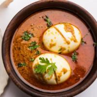 Egg Masala · Boiled eggs cooked with Indian spices, served as thick gravy.
