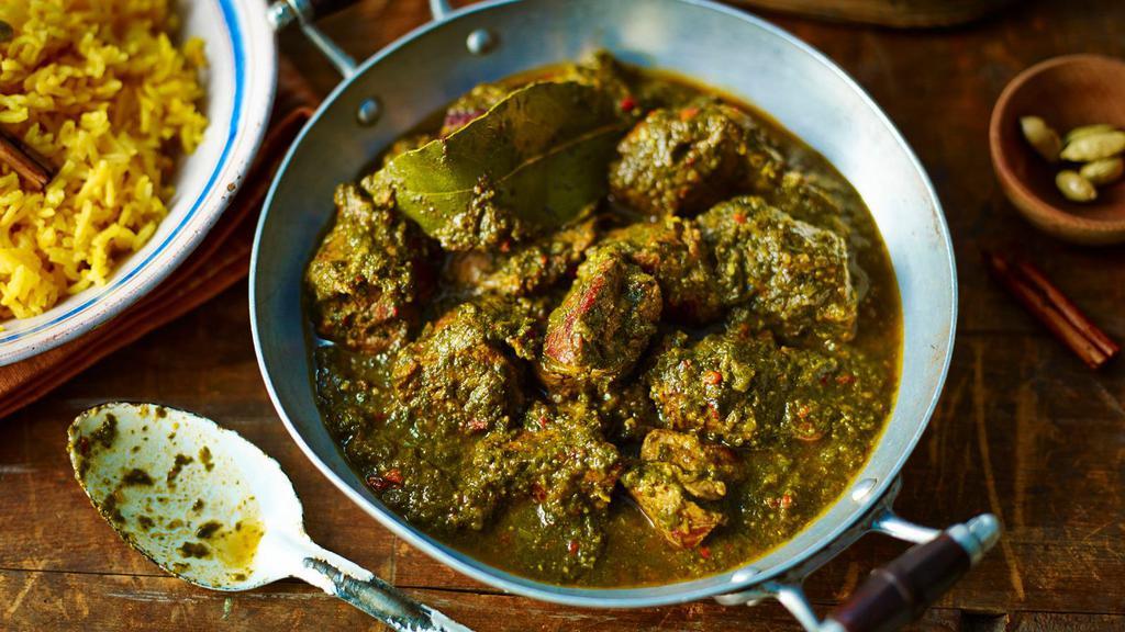 Lamb Saag · Lamb cubes cooked in spinach sauce with indian spices.