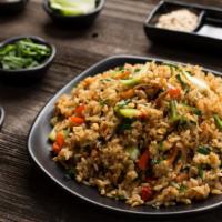 Vegetable Fried Rice · Vegetables and rice stir-fried with spices.