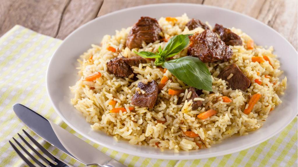 Lamb Fried Rice · Roasted lamb and rice stir-fried with spices.