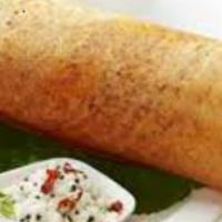 Onion Chili Dosa · Thin crispy crepe with a touch of onion and chili.
