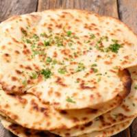 Butter Naan (2 pcs) · Naan finished with butter.