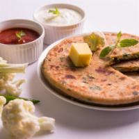 Gobi Paratha (2 pcs) · Whole wheat bread stuffed with cauliflower and spices. Served with yogurt.