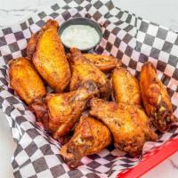 Halal Wings · Halal wings, served regular or spicy. Make your wings a meal combo add seasoned waffle fries...