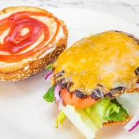Chicken Burger
 · Seasoned ground chicken served with lettuce, tomato, onion and house sauce topped with melte...