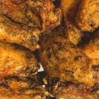 Salt & Pepper Chicken Wings · Unbreaded chicken wings fried then tossed in salt and pepper.