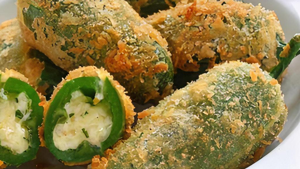 Jalapeno Poppers · Deep fried jalapenos and cream cheese poppers.