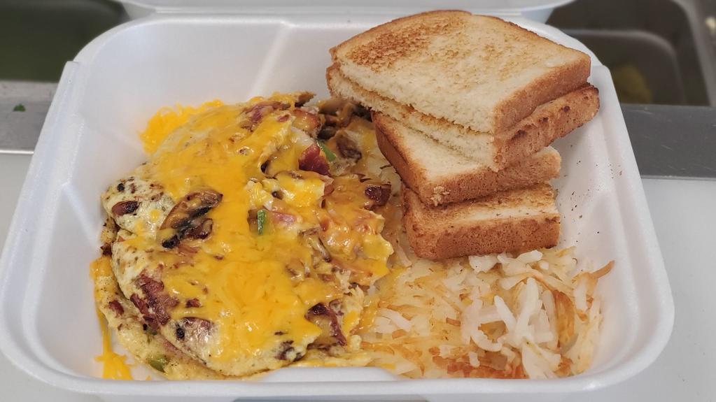 Meat Lover Omelette · Bacon, sausage, ham, bell peppers, onions, mushrooms, cheddar cheese, served with toast and hash browns