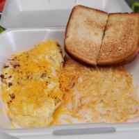 3 Meat Omelette · ham, bacon, sausage and cheddar cheese omelette served with toast and hash browns