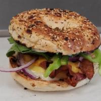 Sausage & Egg · Bagel with sausage & egg, choice of sauce or cream cheese, and veggies