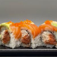 Three Amigo · Spicy tuna, crab meat topped with salmon and avocado.