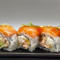Salmon Lover · Deep fried salmon, avocado and cream cheese topped with salmon and tobiko.