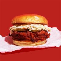 Nashville Hot Chicken Sandwich · Nashville-style spicy hot, crispy fried chicken breast with coleslaw, pickles, and spicy may...