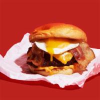 Nashville Hot Breakfast Fried Chicken Sandwich · Nashville-style spicy hot, crispy fried chicken breast with bacon, melted cheddar, spicy may...
