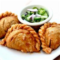 Thai Samosa · Vegetarian. Fried pastry with savory filling of spiced potato, pumpkin, carrot and onion wit...