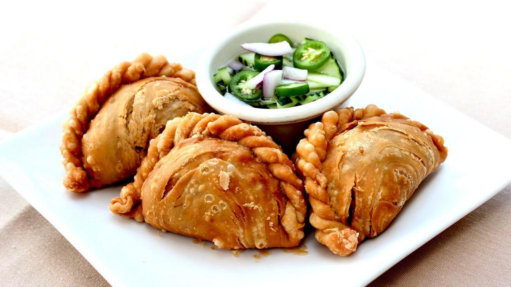 Thai Samosa · Vegetarian. Fried pastry with savory filling of spiced potato, pumpkin, carrot and onion with sweet sauce.