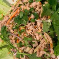 Thai Lettuce Wrap · Minced chicken or tofu with ginger, peanut, chili, lime sauce, herbs and spices. Served with...