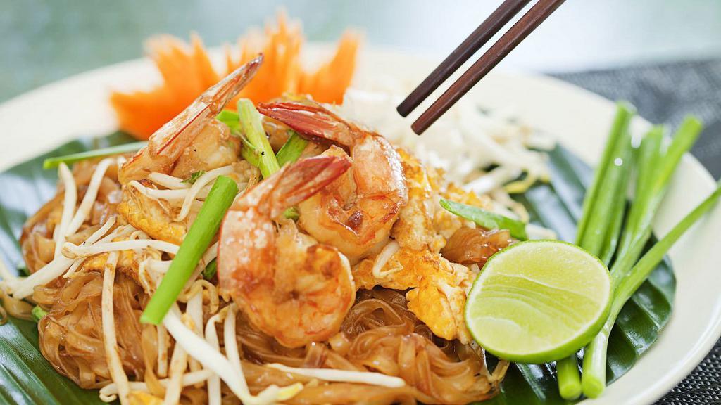 Pad Thai · Thai famous pan-fried noodle of your choice of protein, egg, tofu,
peanut, bean sprout & green onion.