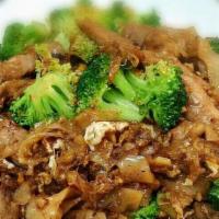 Pad See Ewe · Pan-fried wide rice noodle with your choice of protein, egg, broccoli and Thai black bean sa...