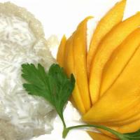 Sweet Sticky Rice with Mango · Thai's favorite dessert of coconut milk flavored sticky rice served with mango.