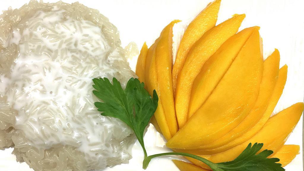 Sweet Sticky Rice with Mango · Thai's favorite dessert of coconut milk flavored sticky rice served with mango.