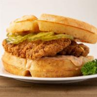 Chicken n Waffles Sandwich · A fried chicken breast drizzed with syrup between two waffles.