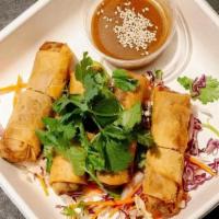 Duck Confit Egg Rolls · Duck confit spring roll with a spicy honey mustard dipping sauce