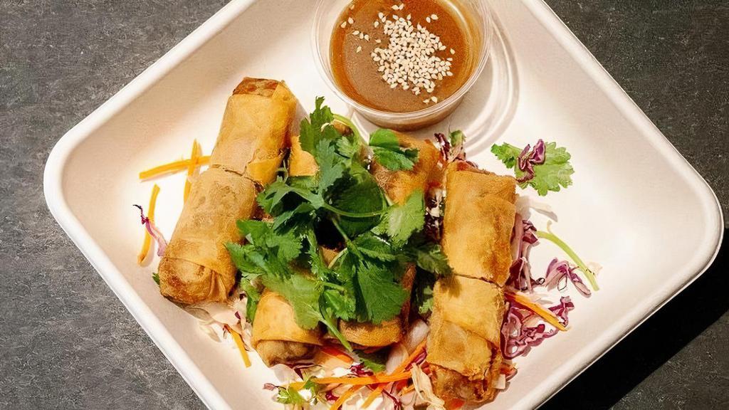 Duck Confit Egg Rolls · Duck confit spring roll with a spicy honey mustard dipping sauce