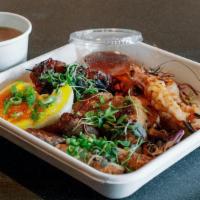 #1 Dac Biet Rice Bowl · Sakura Farms Grilled Pork, Lemongrass Chicken, Blue Shrimp, Duck Spring Roll, Fried Golden Egg