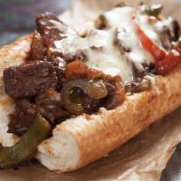 Avocado Philly Cheese Steak · Juicy steak slices, creamy cheese, avocado, mushrooms, onions, and bell peppers loaded onto ...