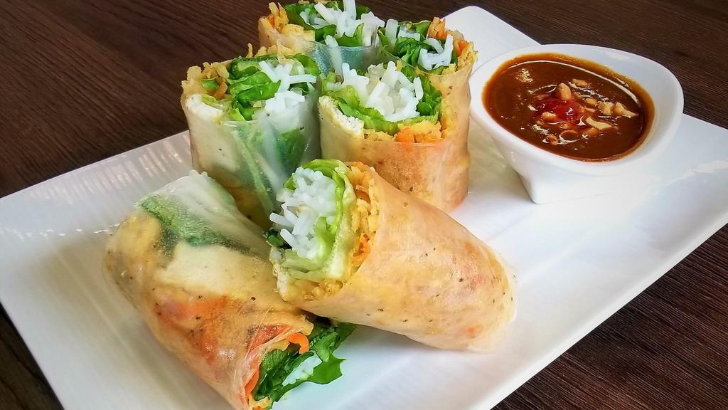 38. Veggie Spring Rolls (2) · Two pieces. Fresh vegetables and veggie shredded fried tofu wrapped in Vietnamese rice paper.