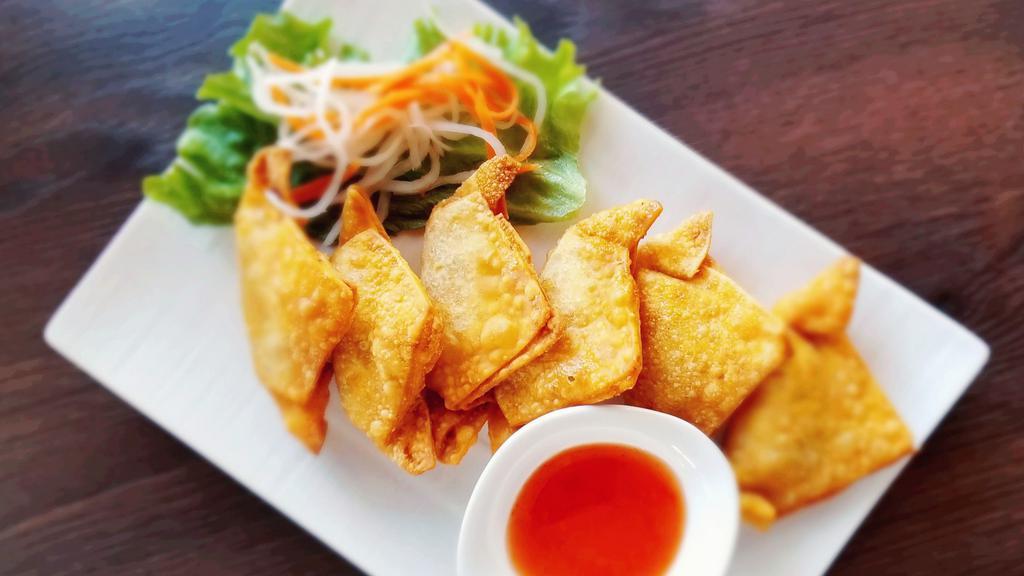 39. Veggie Fried Wonton (6) · Six pieces. Deep-fried wontons filled with mixture of vegetables and beans, served with sweet and sour chili sauce.