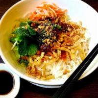 43. Shredded Fried Tofu Vermicelli · Homemade vegan ham and shredded fried tofu served with vermicelli, vegetables, topped with c...