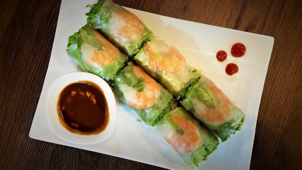 Spring Roll (2pcs) · Fresh vegetables, shrimps, and shredded pork wrapped in Vietnamese rice paper, and served with peanut sauce or fish sauce.