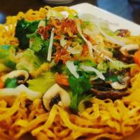 33. House Special Crispy Egg Noodle · Tender and crispy pan-fried egg noodles topped with mixture of chicken, shrimp, squid, fish ...