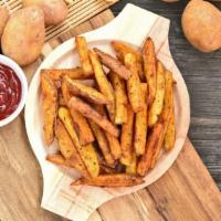 Masala Fries · Golden, fried potatoes tossed in a chili powder.