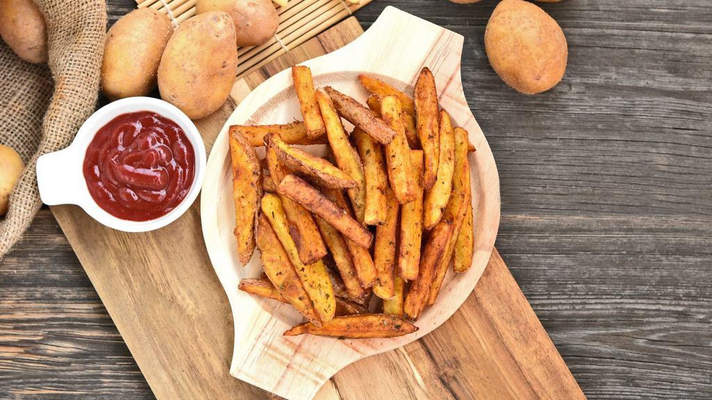 Masala Fries · Golden, fried potatoes tossed in a chili powder.