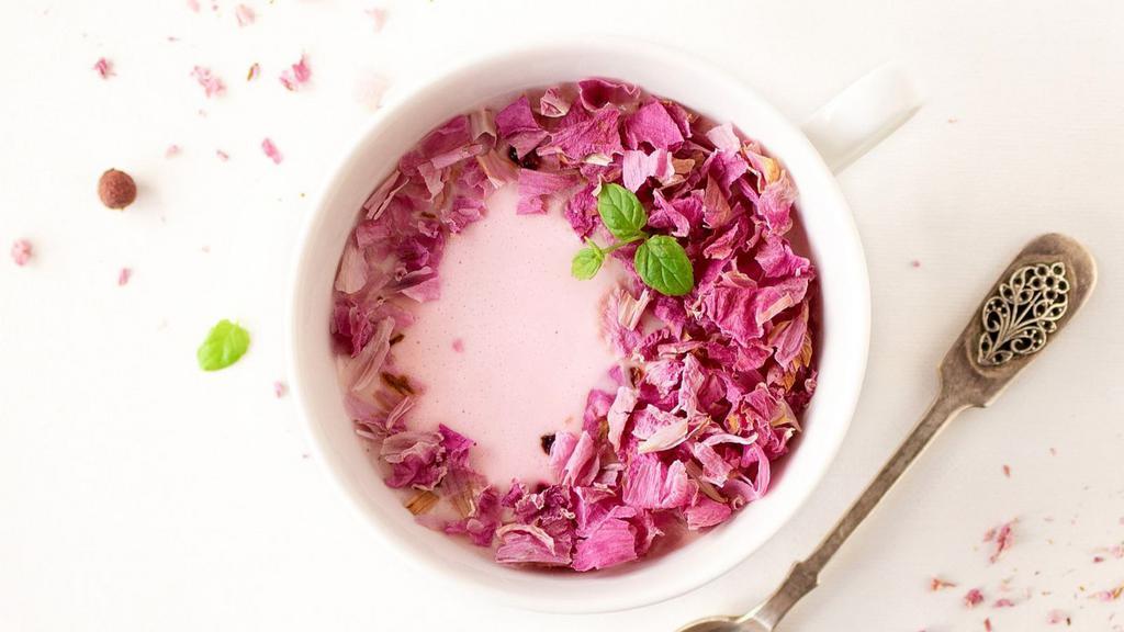 Rose Milk · A cold, aromatic beverage made from chilled milk and rose syrup.