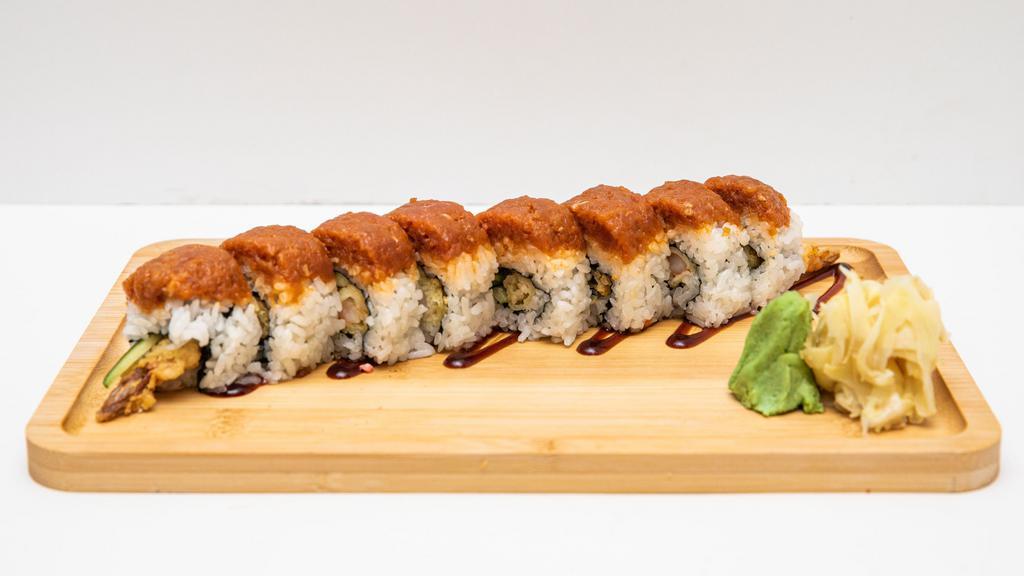 Hawaii Five-O Roll · Shrimp tempura, cucumber, topped with spicy tuna and poke sauce.