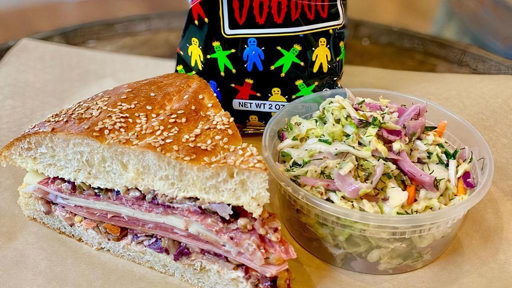 Roasted Mushroom Muffuletta Combo · Add an 8oz herby coleslaw and a 2oz bag of Zapps or dirty chips to your eighth or quarter muffuletta.
Add on a Brown Butter Chocolate Chip Cookie for just $4.