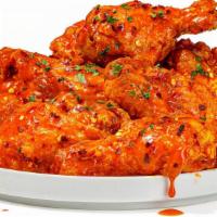 Nashville Hot · the definition of mouthwatering, this wing is packing some heat, balanced with the perfect t...