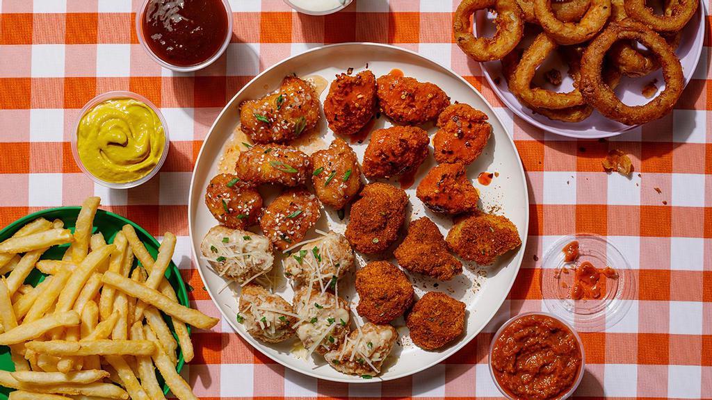 20 pc Combo · 20 boneless wings + 2 sides. Pick up to 4 flavors and 4 dipping sauces.