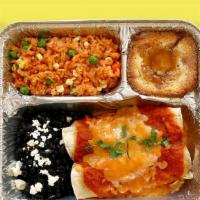 Tv Dinner Cheese Enchiladas · Hearty meals made in-house, frozen in retro-style trays, and ready to pop in the oven when y...