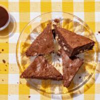 Brownie Bites · housemade chocolate brownies baked with white chocolate chips with chocolate sauce on the si...