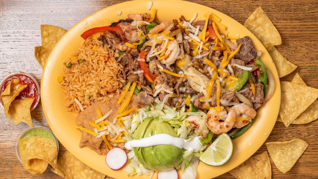Alambres (Steak & Bacon) Dinner Plate · Sauteed Steak Chunks, Bacon, Red & Green Bell Peppers,.      Onions & Melted Jack Cheese. Mexican Rice, Lettuce,.      Guacamole, Sour Cream, Beans and Corn Tortillas
