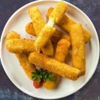 Thrive For Crisp Mozzarella  · Mozzarella cheese sticks, battered and fried until golden brown. Served with a side of marin...